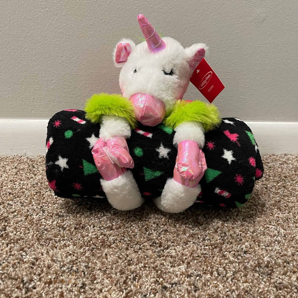 Unicorn stuffed animal with blanket